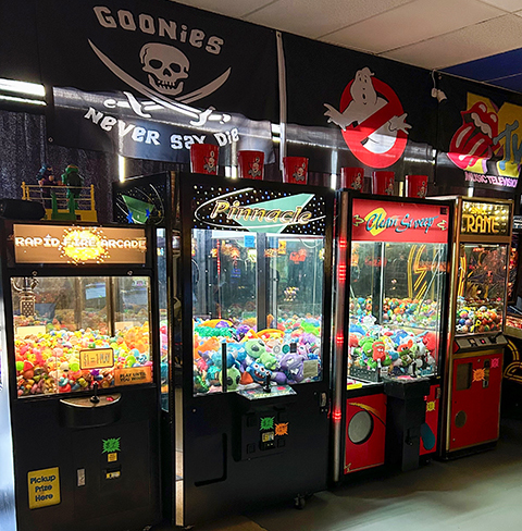 Claw machines and pinball machines.
